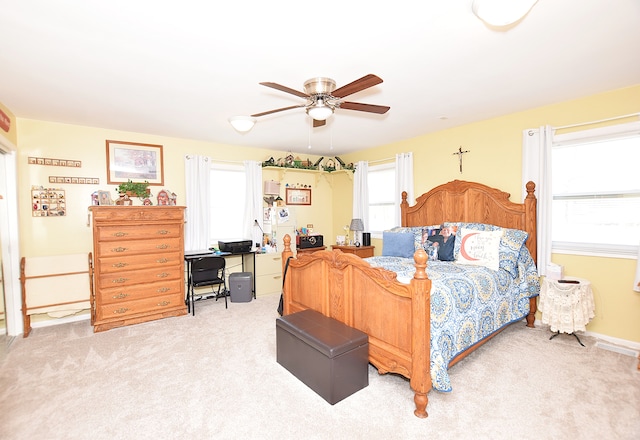 bedroom featuring carpet and ceiling fan