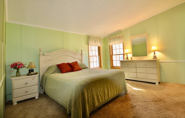 carpeted bedroom featuring a textured ceiling and ornamental molding