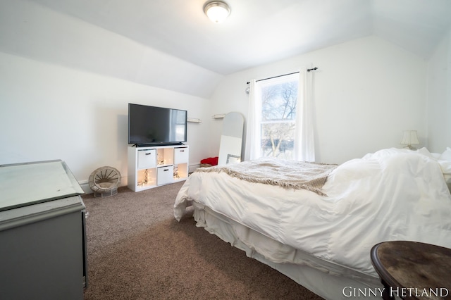 carpeted bedroom with vaulted ceiling