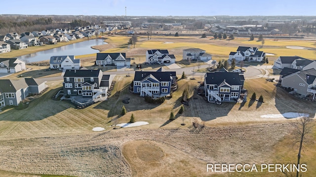 birds eye view of property featuring a residential view and a water view