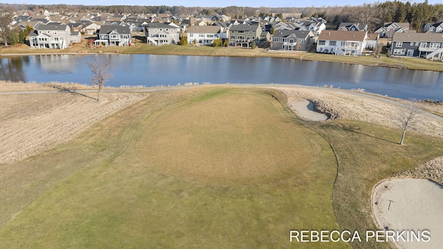 aerial view featuring a residential view and a water view