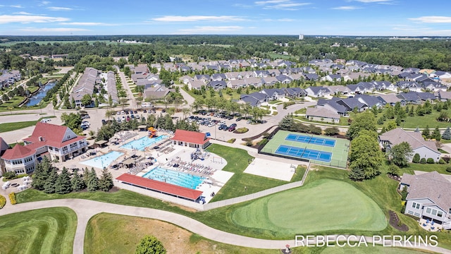 aerial view with a residential view and golf course view