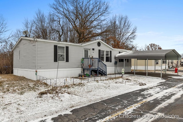 manufactured / mobile home with a carport