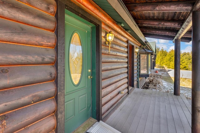 property entrance with log veneer siding