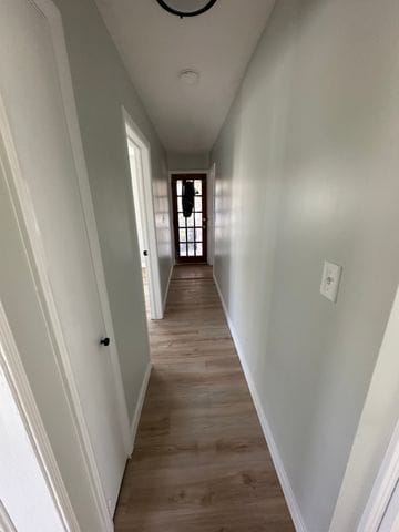 4120 Lotus Dr, Waterford, MI 48329 - hall featuring light wood-style floors