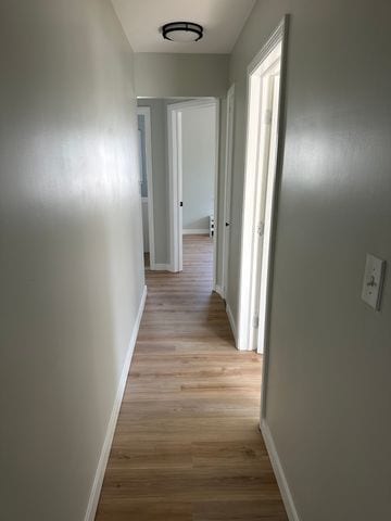 4120 Lotus Dr, Waterford, MI 48329 - hallway with light wood finished floors