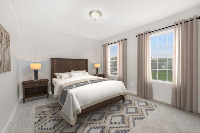 bedroom featuring light colored carpet and baseboards