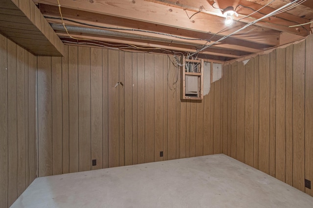 unfinished below grade area with wood walls