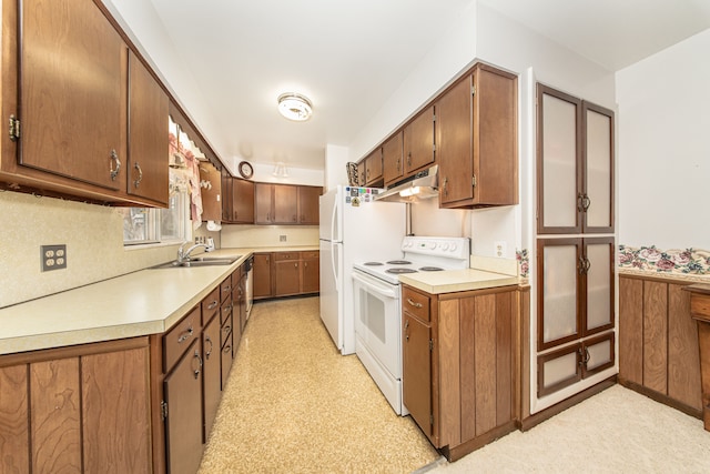 kitchen featuring light floors, white range with electric cooktop, a sink, light countertops, and under cabinet range hood