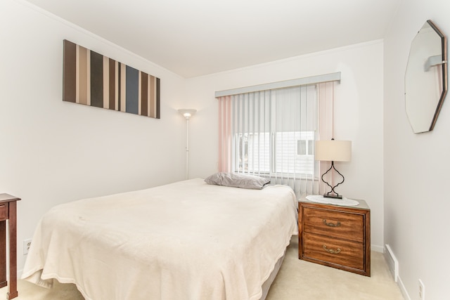 carpeted bedroom with baseboards