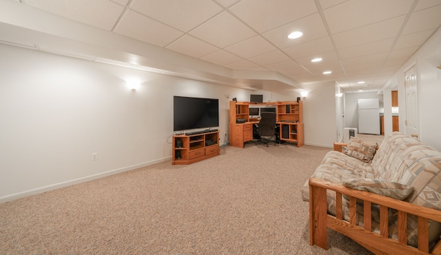 living room featuring recessed lighting, baseboards, light carpet, and a paneled ceiling