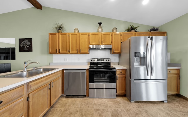 kitchen with under cabinet range hood, lofted ceiling with beams, decorative backsplash, stainless steel appliances, and a sink