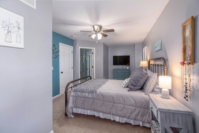 bedroom with carpet flooring and a ceiling fan