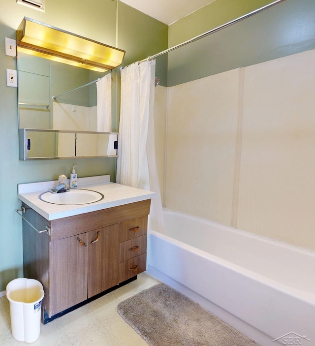 bathroom featuring shower / tub combo with curtain and vanity