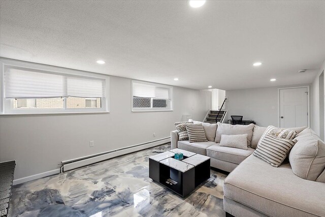 living room featuring a baseboard heating unit, baseboards, stairway, recessed lighting, and a textured ceiling