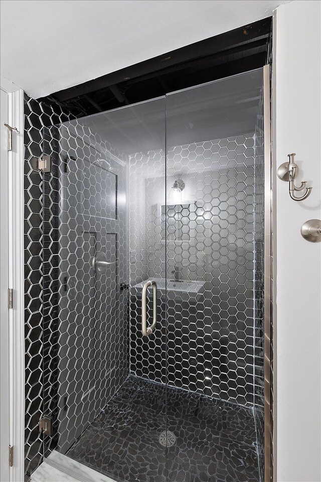 full bath featuring a stall shower