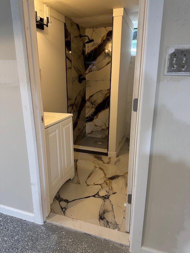 5066 Bedford St, Detroit, MI 48224 - bathroom with a marble finish shower and vanity
