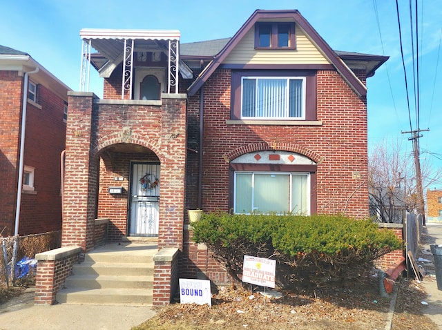 view of front of house with brick siding