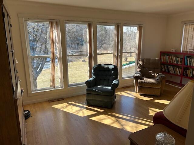 sitting room with wood finished floors