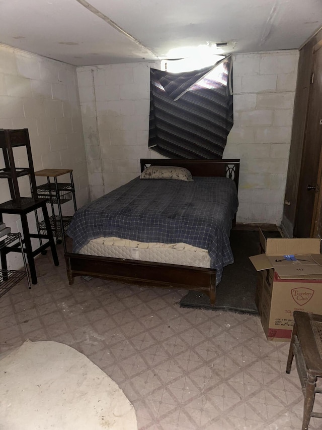 bedroom featuring light floors