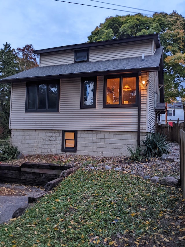 view of front of property with fence