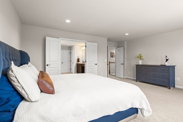 bedroom featuring recessed lighting, baseboards, light carpet, and visible vents