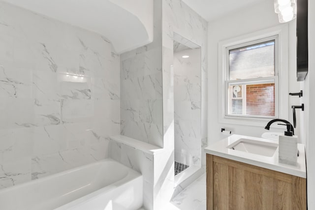 bathroom with a bathing tub, marble finish floor, walk in shower, and vanity