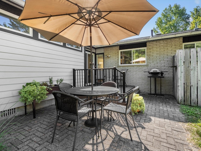 view of patio with outdoor dining area