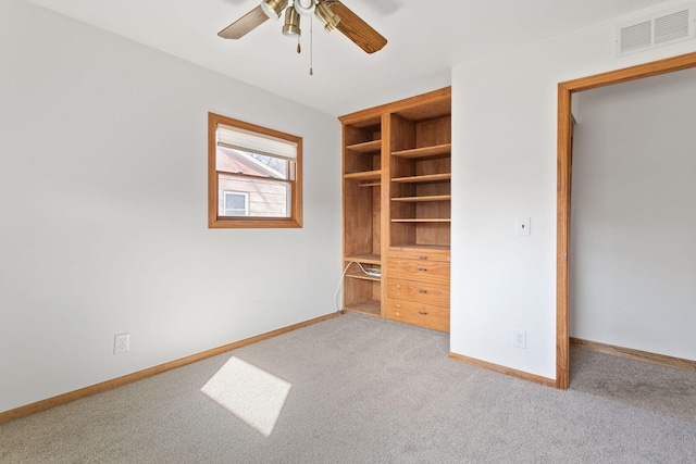 unfurnished bedroom featuring visible vents, baseboards, a closet, and carpet flooring