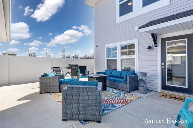 view of patio with a grill, outdoor lounge area, and fence