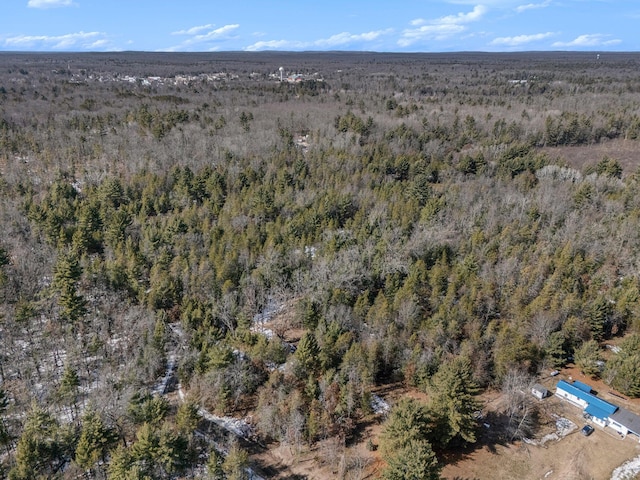 bird's eye view featuring a forest view