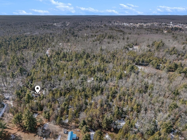 drone / aerial view with a view of trees