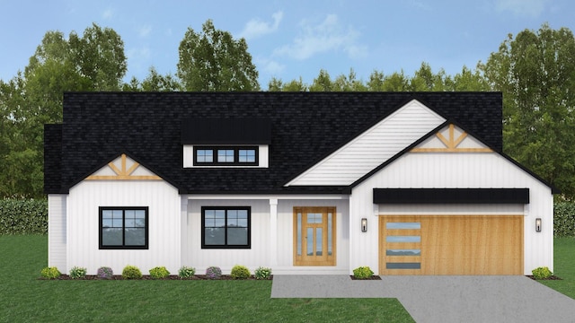 modern farmhouse with an attached garage, a front yard, driveway, and roof with shingles