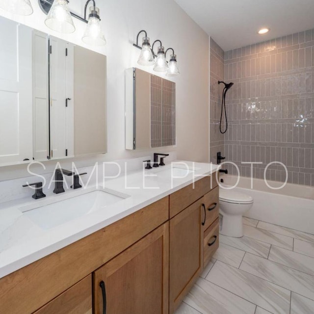 bathroom with double vanity, toilet, shower / bathtub combination, and a sink