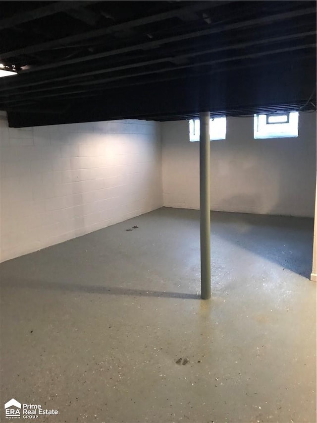 basement with concrete block wall