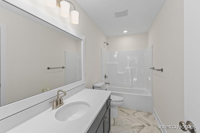 full bathroom featuring toilet, marble finish floor, shower / tub combination, baseboards, and vanity