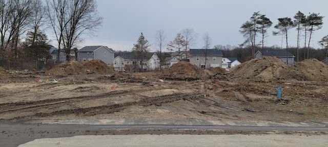 view of yard featuring a residential view