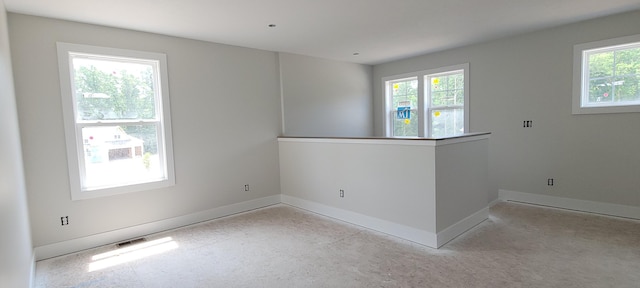 1442 Kimber Dr Unit 120, Lowell, MI 49331 - spare room with baseboards