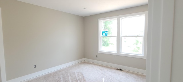 1442 Kimber Dr Unit 120, Lowell, MI 49331 - empty room featuring baseboards and light colored carpet