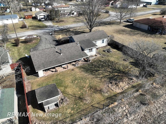 birds eye view of property with a residential view