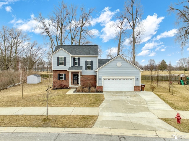 view of front facade featuring brick siding, an attached garage, driveway, and a front lawn