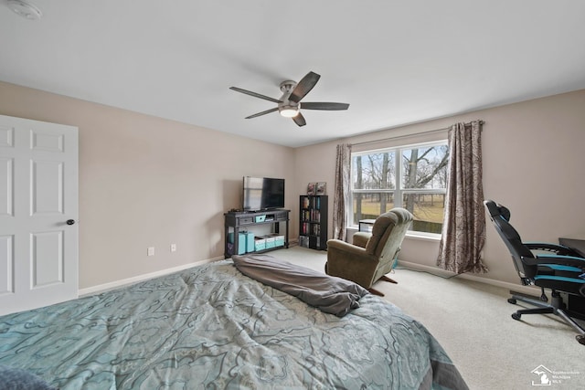 bedroom with ceiling fan, carpet, and baseboards