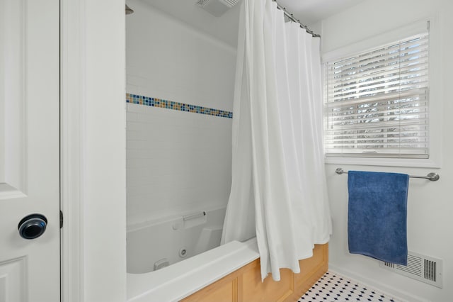 full bathroom featuring visible vents and a combined bath / shower with jetted tub