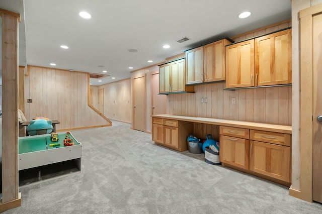 rec room featuring recessed lighting, built in desk, light colored carpet, and visible vents