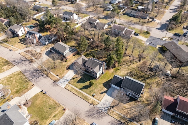 birds eye view of property with a residential view