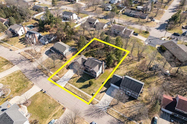 birds eye view of property with a residential view