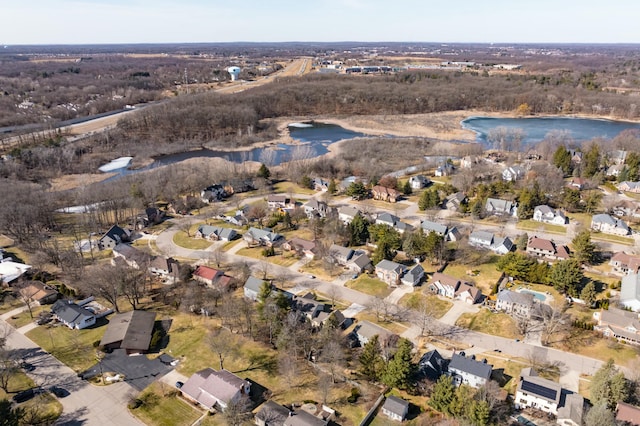 bird's eye view with a residential view and a water view