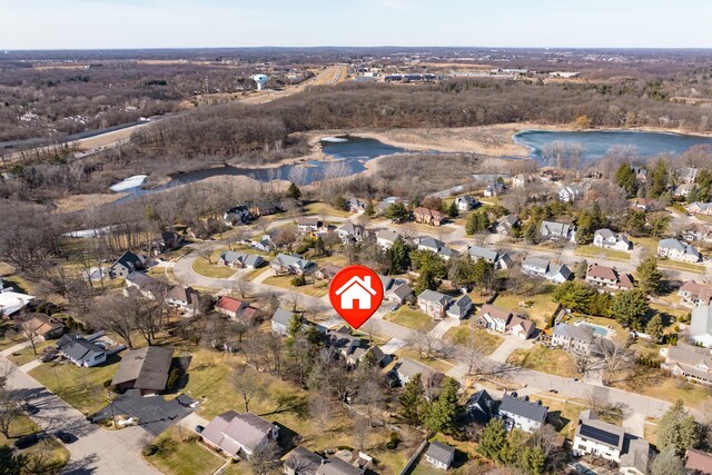 aerial view featuring a residential view and a water view