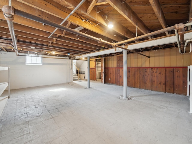 basement featuring stairway