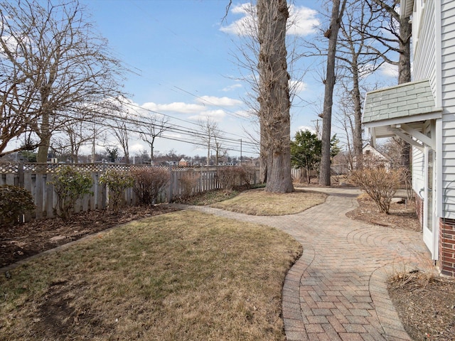 view of yard featuring fence